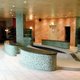 Влагостойкие панели Lux Elements SL с надрезами по длине для создания округлых форм - пример использования
